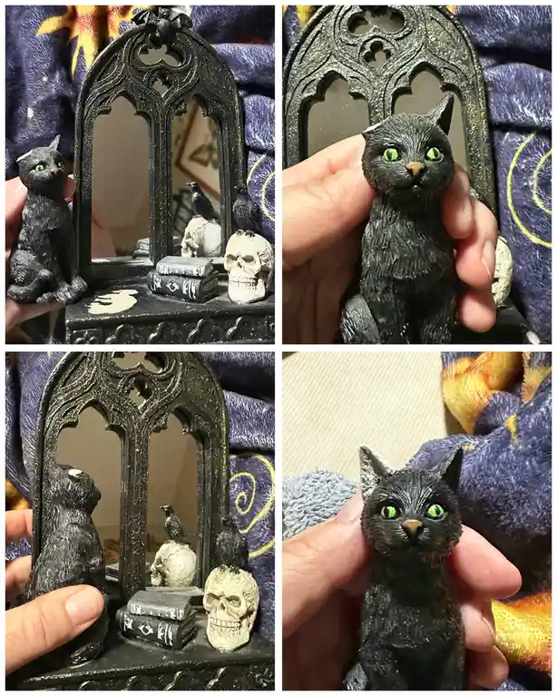 A four-panel image shows a small black cat figurine with glowing green eyes being held up next to a gothic-style mirror. The…