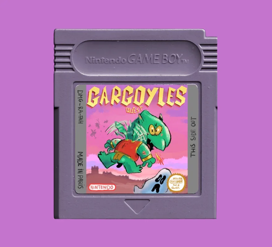A gray Nintendo Game Boy cartridge with a custom label showing a green gargoyle in a red shirt flying over a ghost, with the…