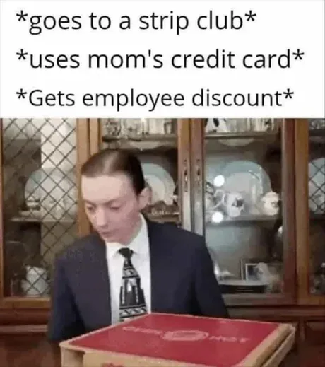 A man in a suit and tie is looking down at a red Domino's pizza box. The text above him reads: '*goes to a strip club*'…
