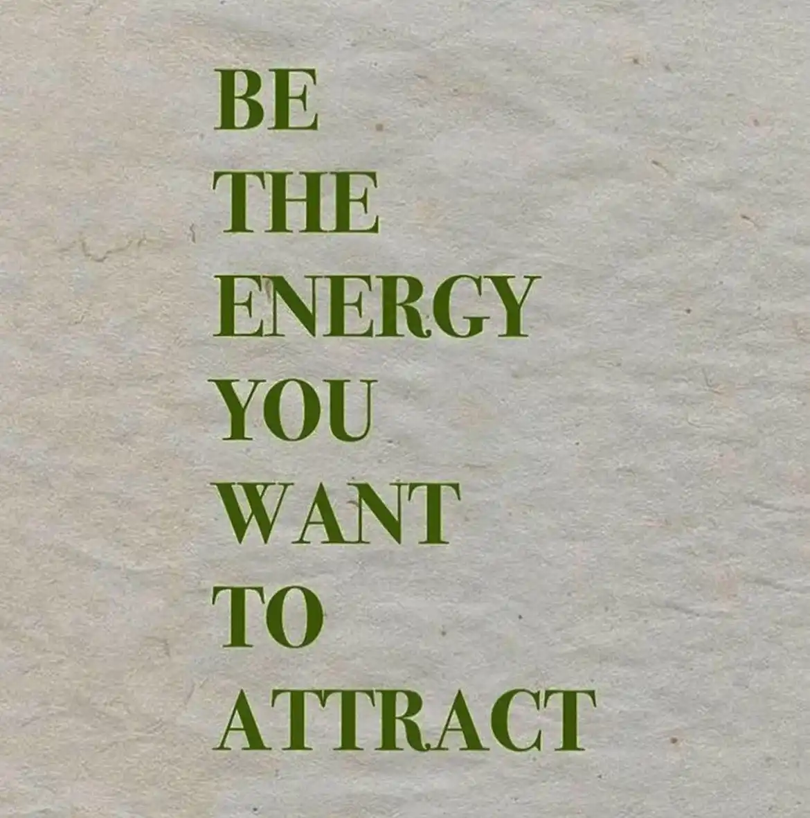 The image displays the phrase 'BE THE ENERGY YOU WANT TO ATTRACT' in bold, green, capitalized letters centered on a…