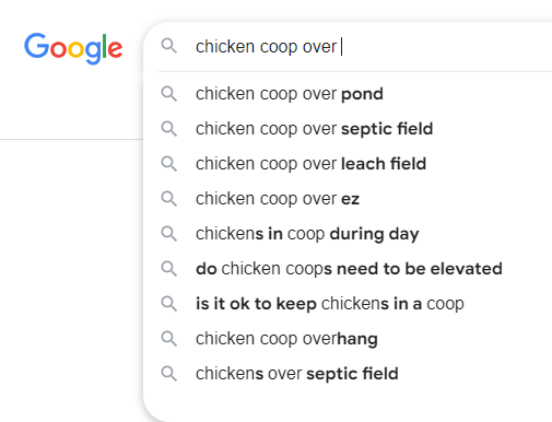 A Google search bar shows the partially typed query 'chicken coop over |' with autocomplete suggestions below. The…