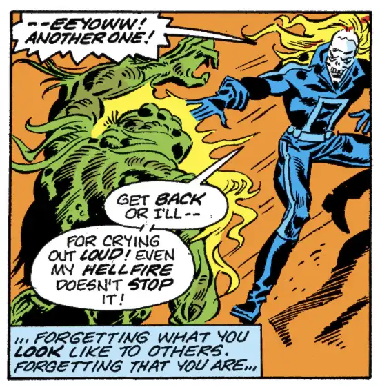 A comic book panel shows a blue-suited skeleton superhero (Ghost Rider) confronting a green, monstrous creature. The…