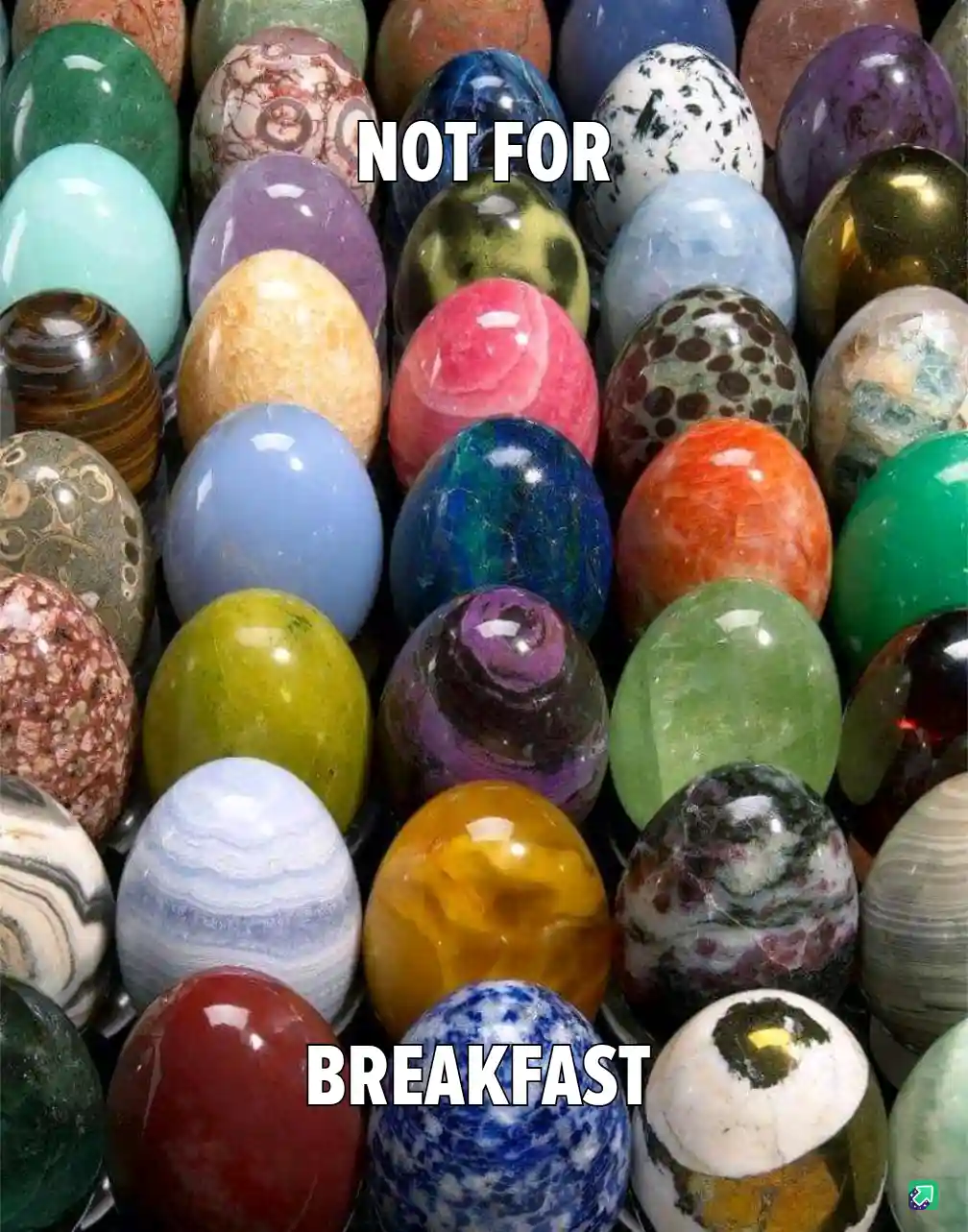 The image displays a dense grid of polished, colorful, egg-shaped stones or minerals with varied patterns and hues. Overlaid…