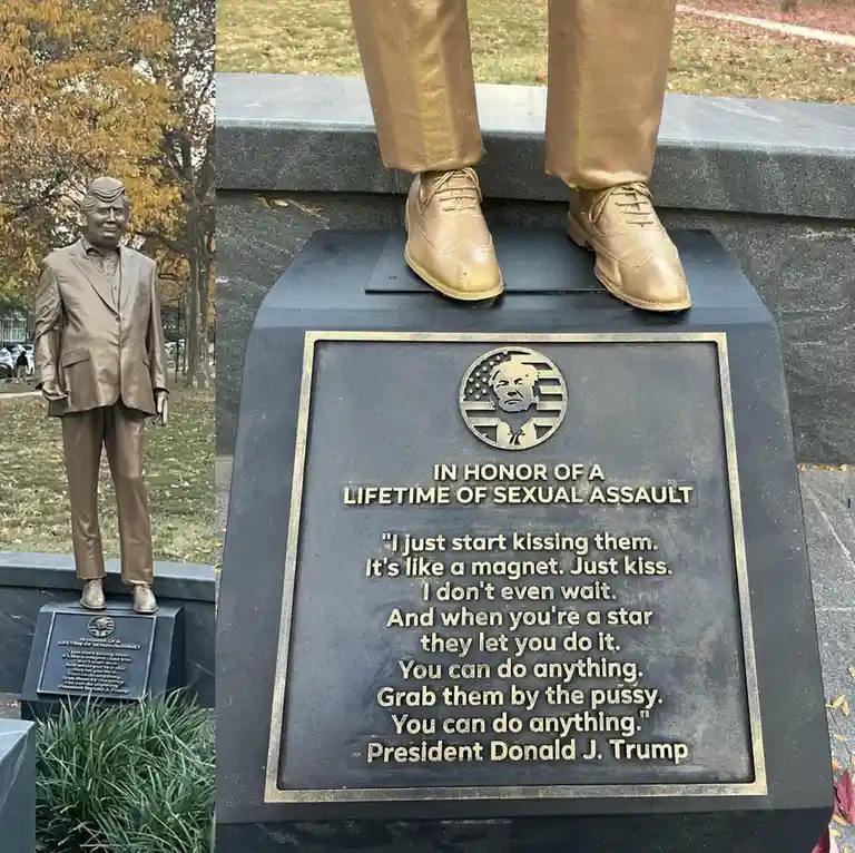 A bronze statue of Donald Trump stands on a pedestal with a plaque that reads 'IN HONOR OF A LIFETIME OF SEXUAL ASSAULT' and…