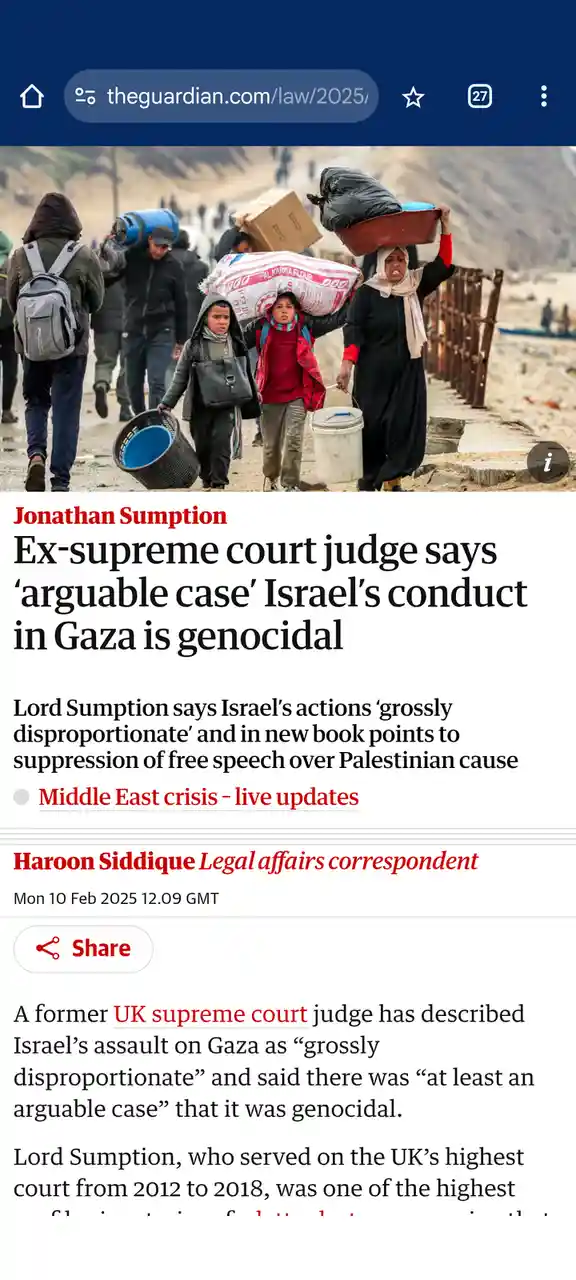 A screenshot of a The Guardian news article featuring a photo of displaced people carrying heavy bags and buckets while…
