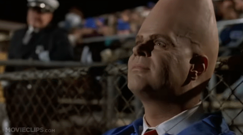 A six-panel image from the movie 'Major League' shows a bald man in a blue jacket looking up, then wearing sunglasses, then…