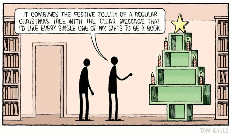 Two stick figures stand in a room with bookshelves, one gesturing toward a Christmas tree made of stacked green book covers…