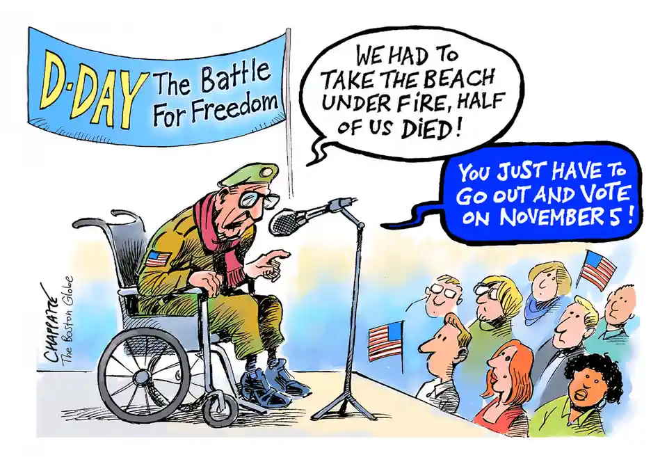 A cartoon depicts a veteran in a wheelchair speaking into a microphone at an event under a banner reading 'D-DAY The Battle…