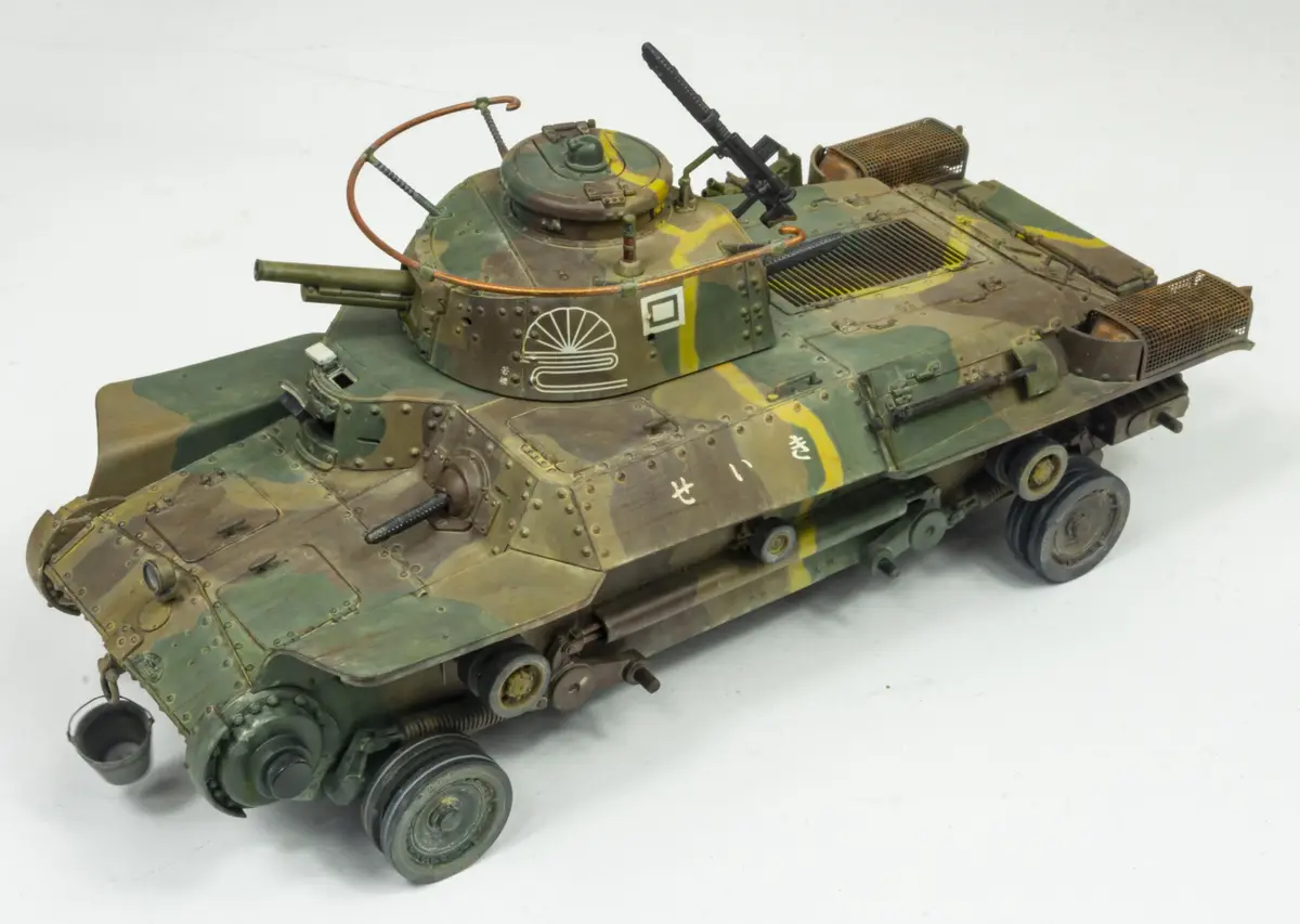 A highly detailed scale model of a Japanese Type 97 Chi-Ha medium tank, painted in green and yellow camouflage with visible…