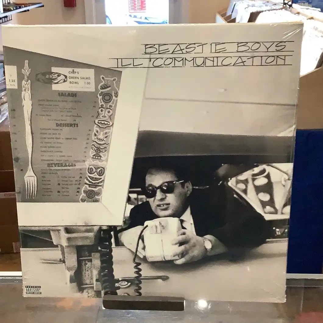 A black-and-white album cover of Beastie Boys' 'Ill Communication' is shown, but the right side has been digitally altered…