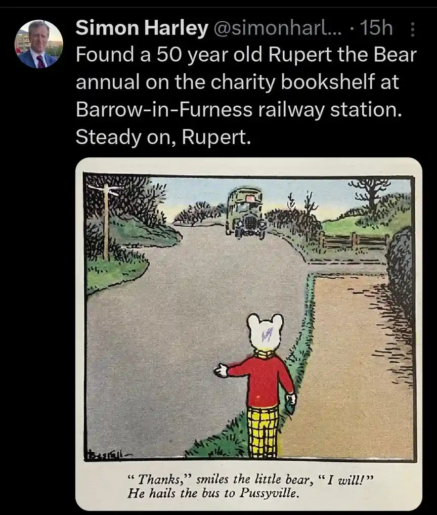 A vintage cartoon depicts Rupert the Bear, a small white bear in a red shirt and yellow plaid pants, standing on a rural…