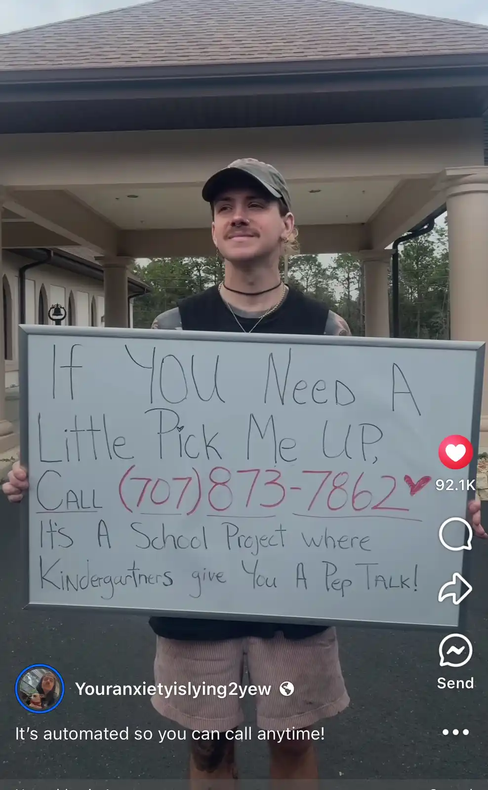 A person stands outdoors holding a whiteboard with handwritten text offering a 'pick me up' service via phone call, claiming…