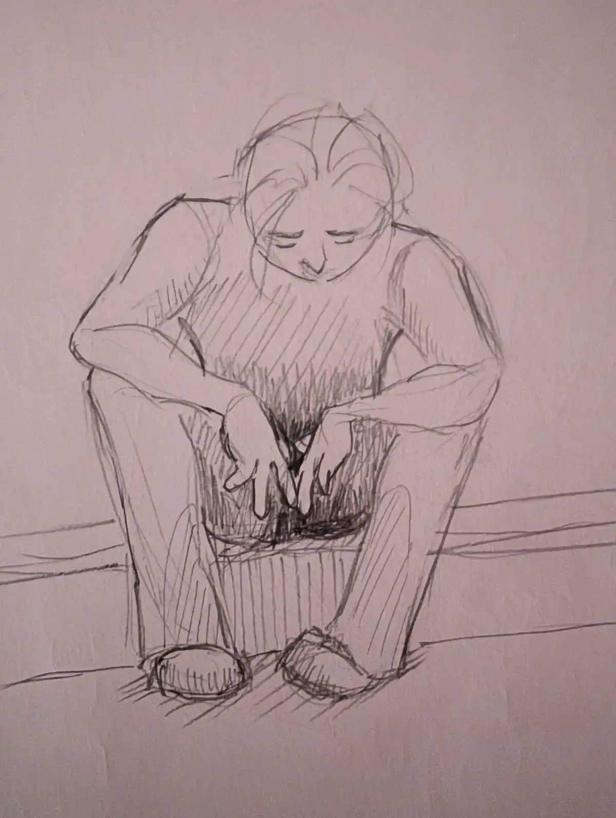 A pencil sketch depicts a person sitting on the floor with their head bowed and hands clasped over their lap, conveying a…