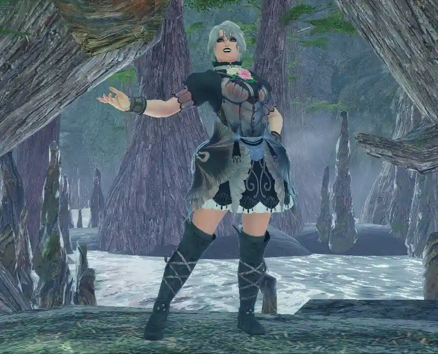 A video game character with silver hair and ornate armor stands in a misty, forested area with large trees and water. The…