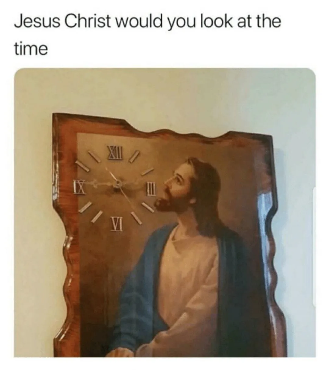 A wooden-framed wall clock features a painted image of Jesus Christ looking upward, with the clock face and Roman numerals…