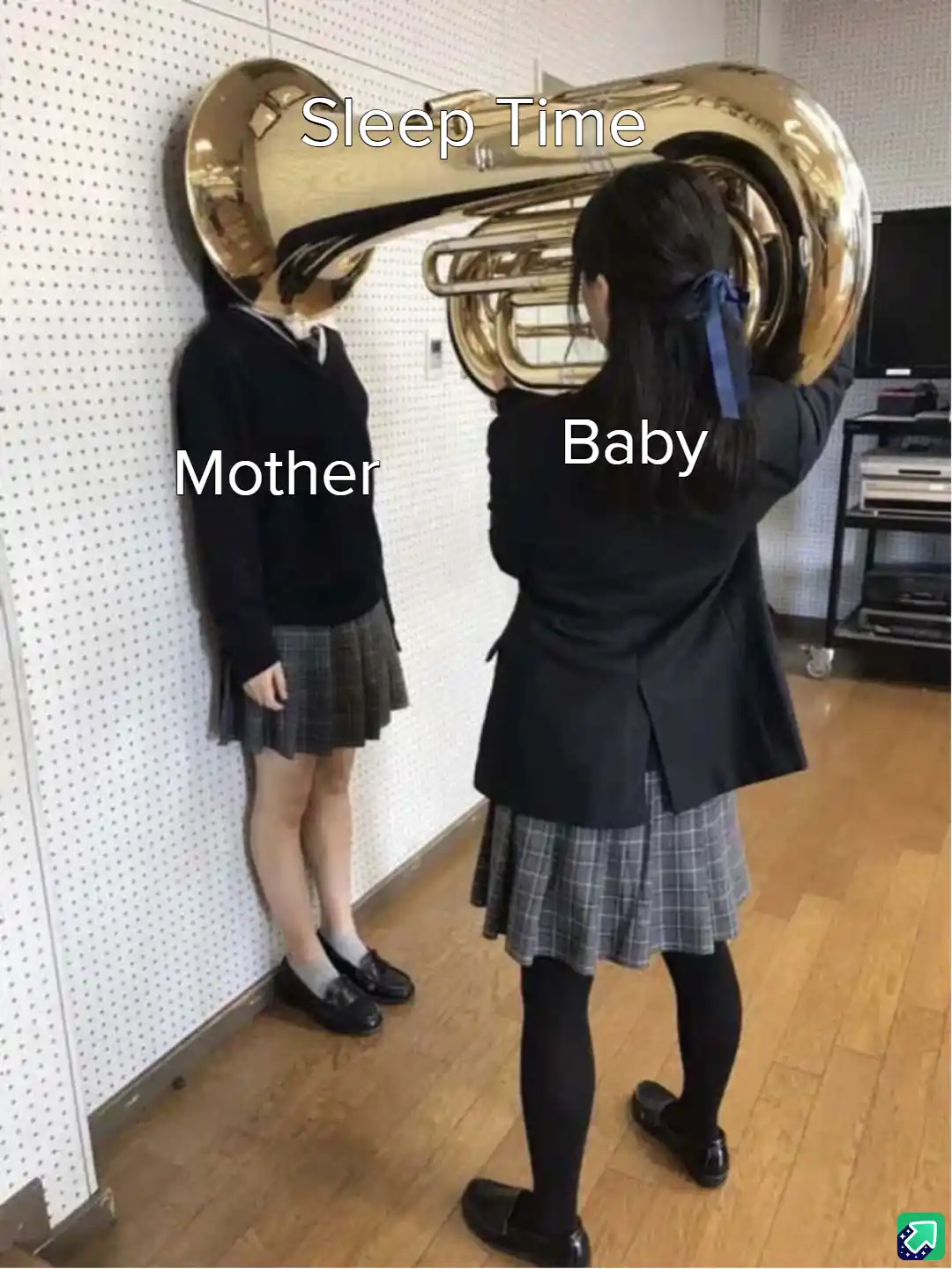 Two girls in school uniforms are shown; one leans against a wall with a tuba for a head labeled 'Mother', while the other…
