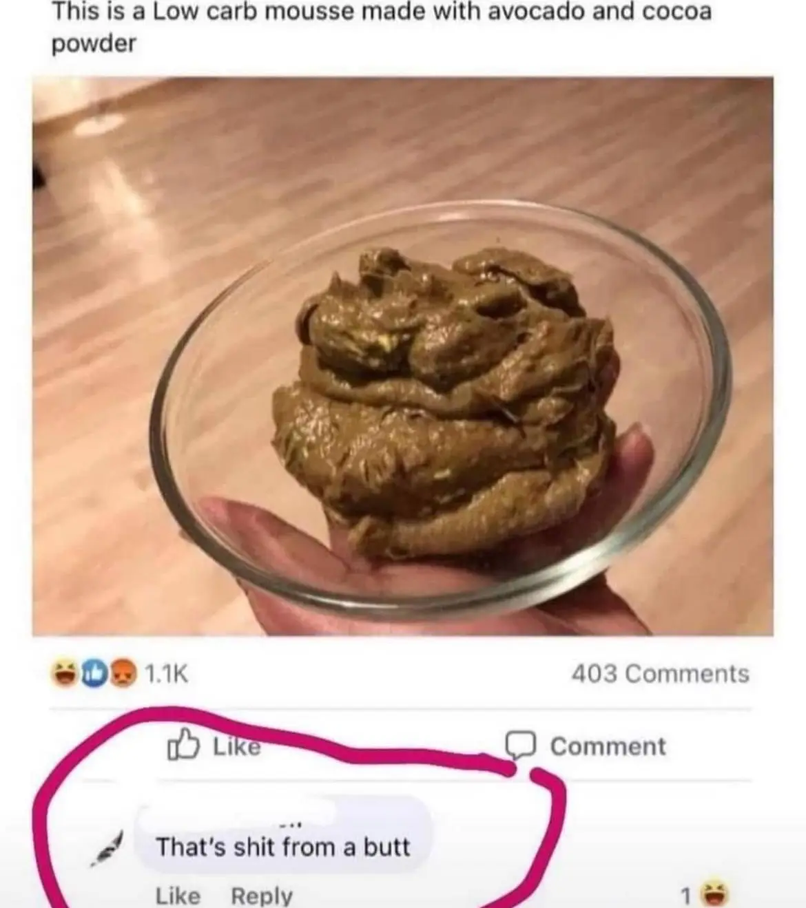 A hand holds a small glass bowl containing a greenish-brown, lumpy, poop-shaped mousse, with overlaid text claiming it's a…