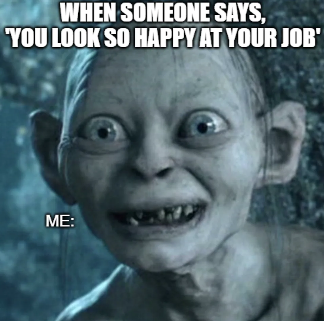 The image shows a close-up of the character Gollum from 'The Lord of the Rings' with a wide-eyed, manic, toothy grin. The…