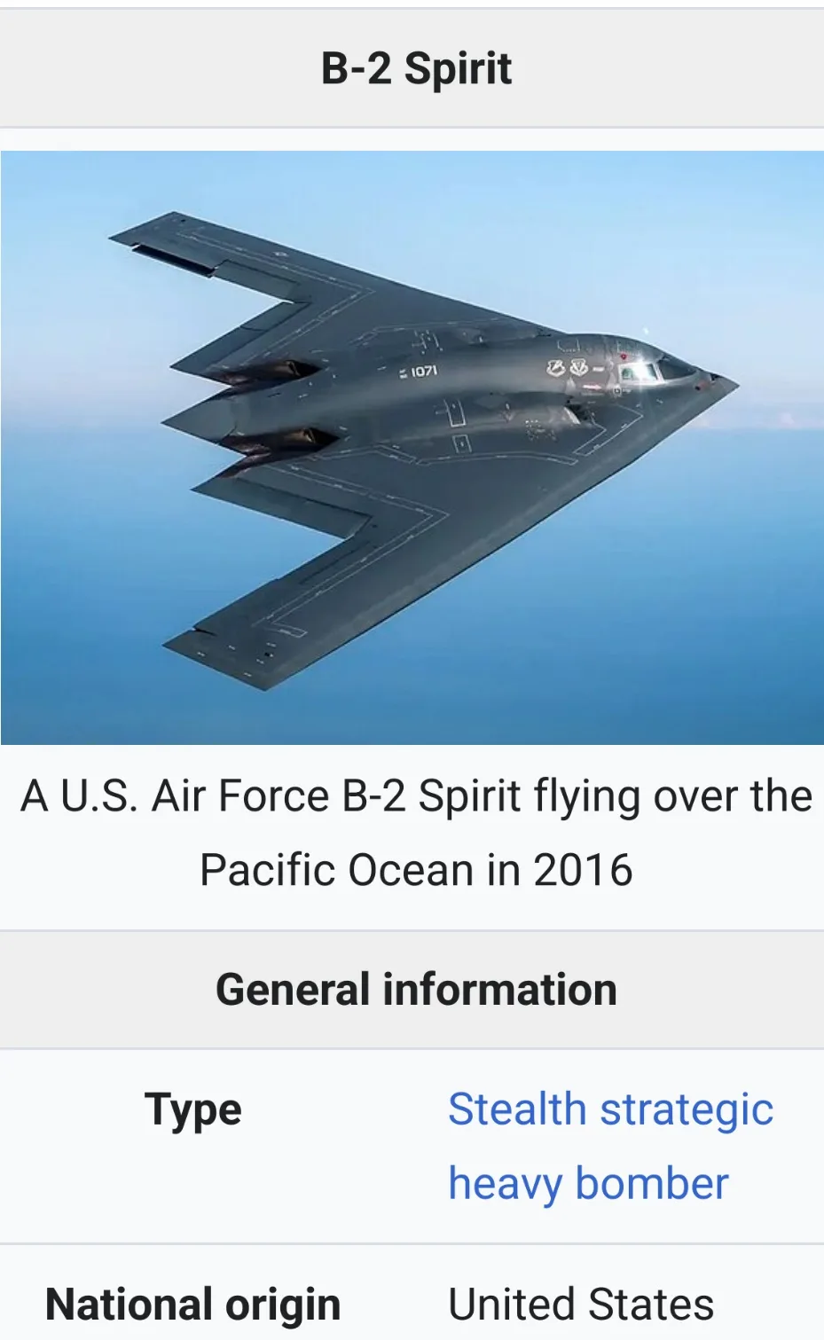 The image displays a U.S. Air Force B-2 Spirit stealth bomber flying over the Pacific Ocean in 2016, with overlaid text…