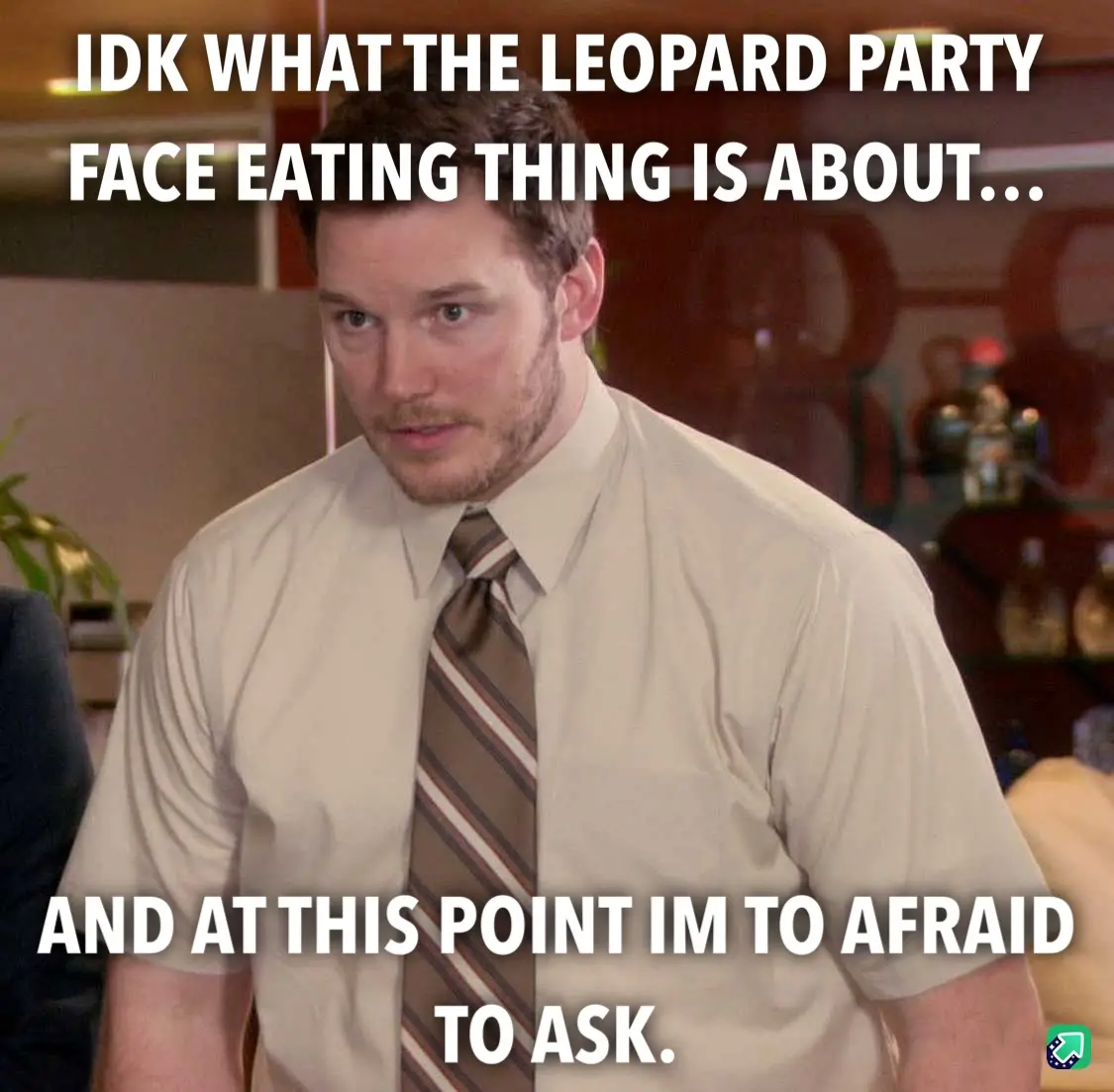A man in a beige shirt and striped tie looks confused and slightly alarmed, with white text overlaid that reads 'IDK WHAT…