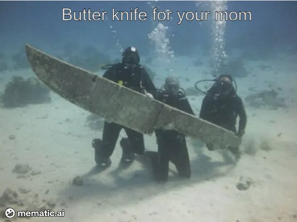 Three scuba divers underwater are holding a giant, rusted butter knife. The text overlaid at the top reads 'Butter knife for…