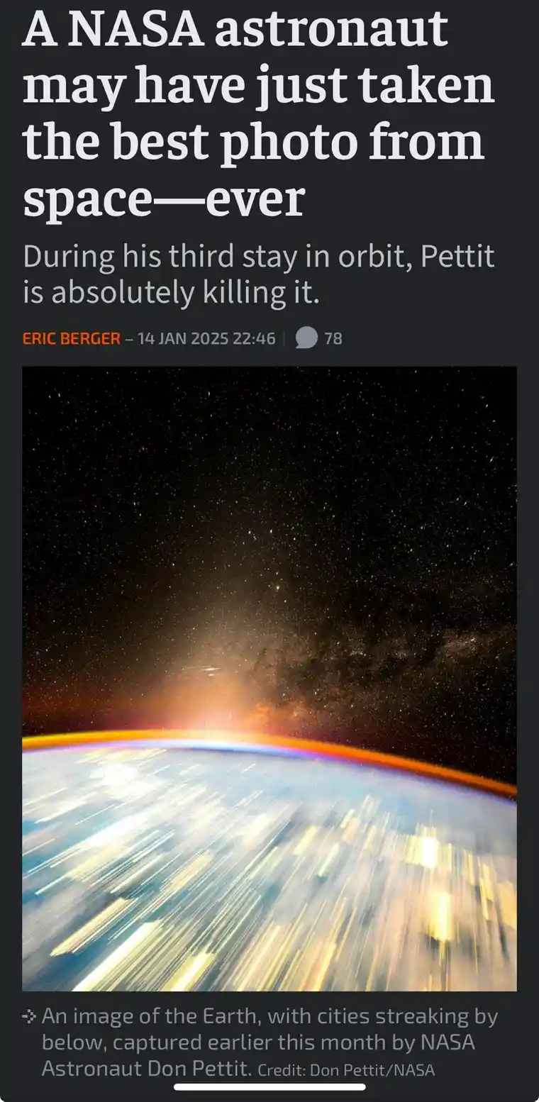 A screenshot of a news article header showing a stunning space photograph of Earth's curved horizon with streaking city…