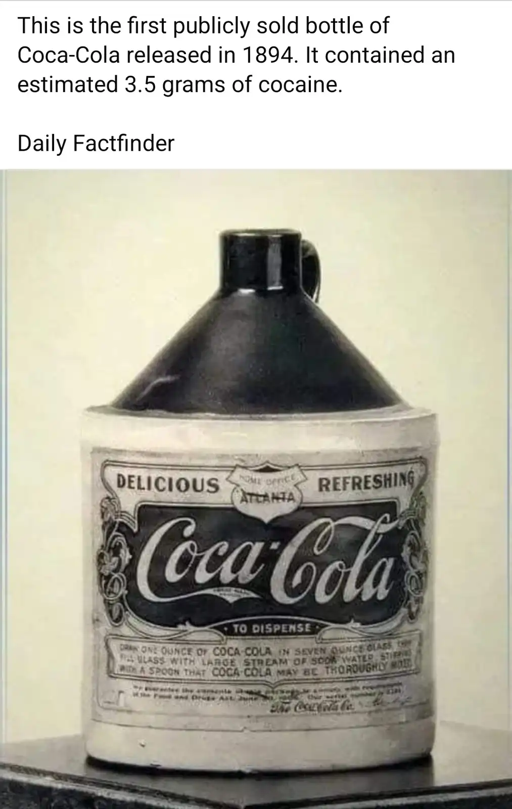 An old black ceramic jug with a white paper label reading 'Coca-Cola' and 'DELICIOUS REFRESHING' is shown. The text overlay…