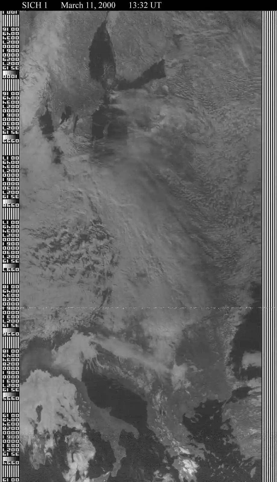 A black and white satellite image from SICH 1 dated March 11, 2000, at 13:32 UT, showing cloud patterns over Earth with a…