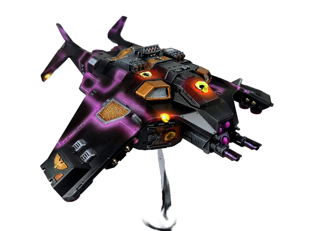 A detailed, painted miniature of a black and purple futuristic spaceship with glowing orange and yellow accents, mounted on…