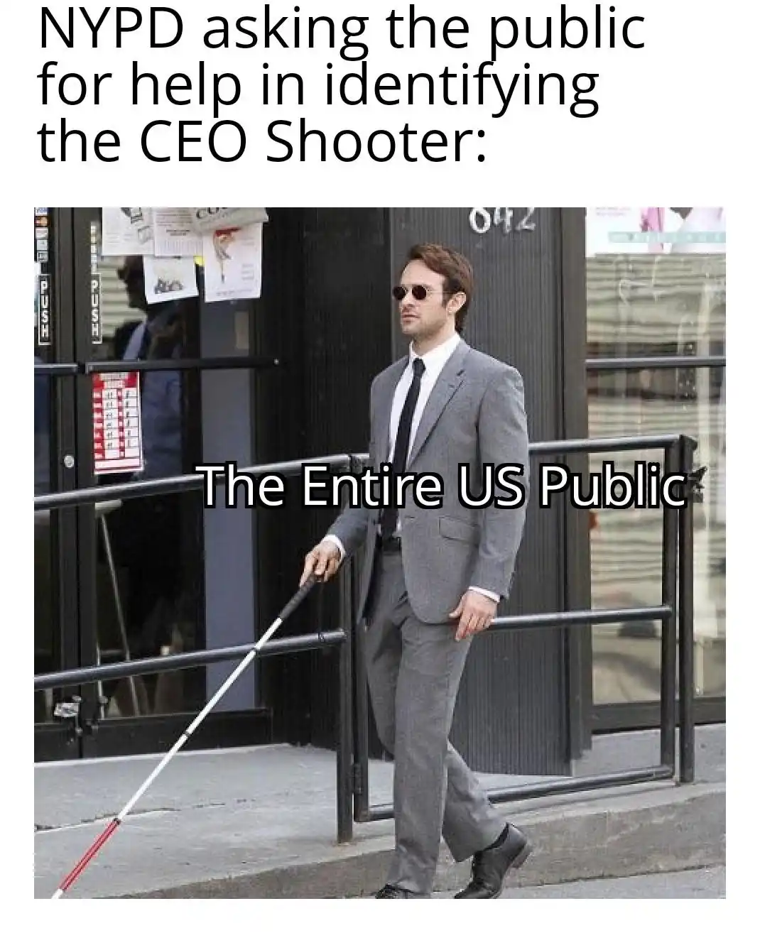 A man in a gray suit and sunglasses walks down a sidewalk holding a white cane, with text overlaid that reads 'NYPD asking…