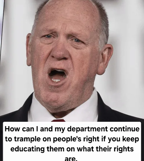 A close-up photo of a middle-aged white man in a suit and tie, mouth open as if shouting or speaking emphatically. A white…