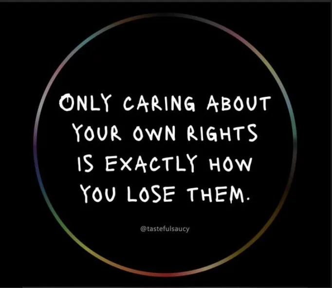 A black background features a rainbow-colored circle framing white, handwritten-style text that reads 'ONLY CARING ABOUT…