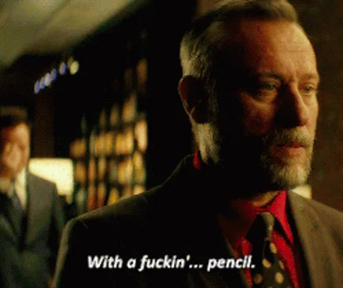 A six-panel meme featuring a man in a suit and red shirt repeatedly saying 'With a fuckin'... pencil.' while looking…