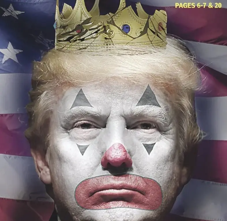 A close-up image of Donald Trump with a gold crown, clown makeup including white face paint, black triangles around his…