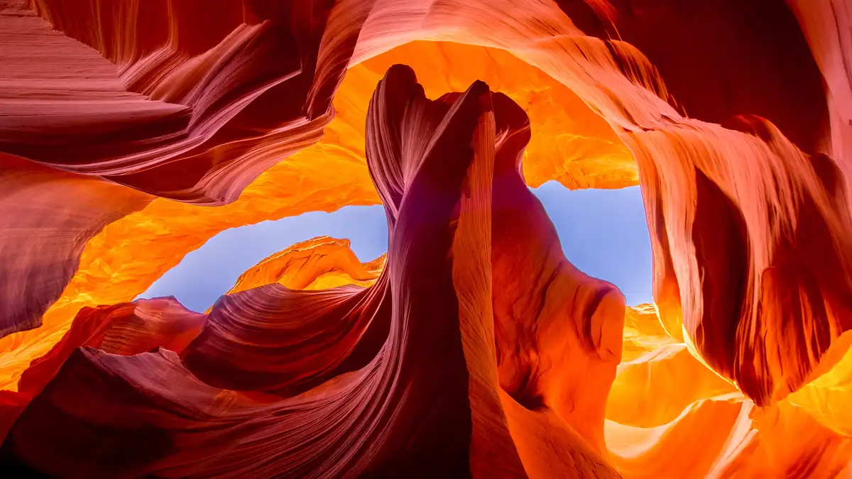 Antelope Canyon, a red-sandstone marvel and the most photographed slot canyon in the US, is actually two canyons…