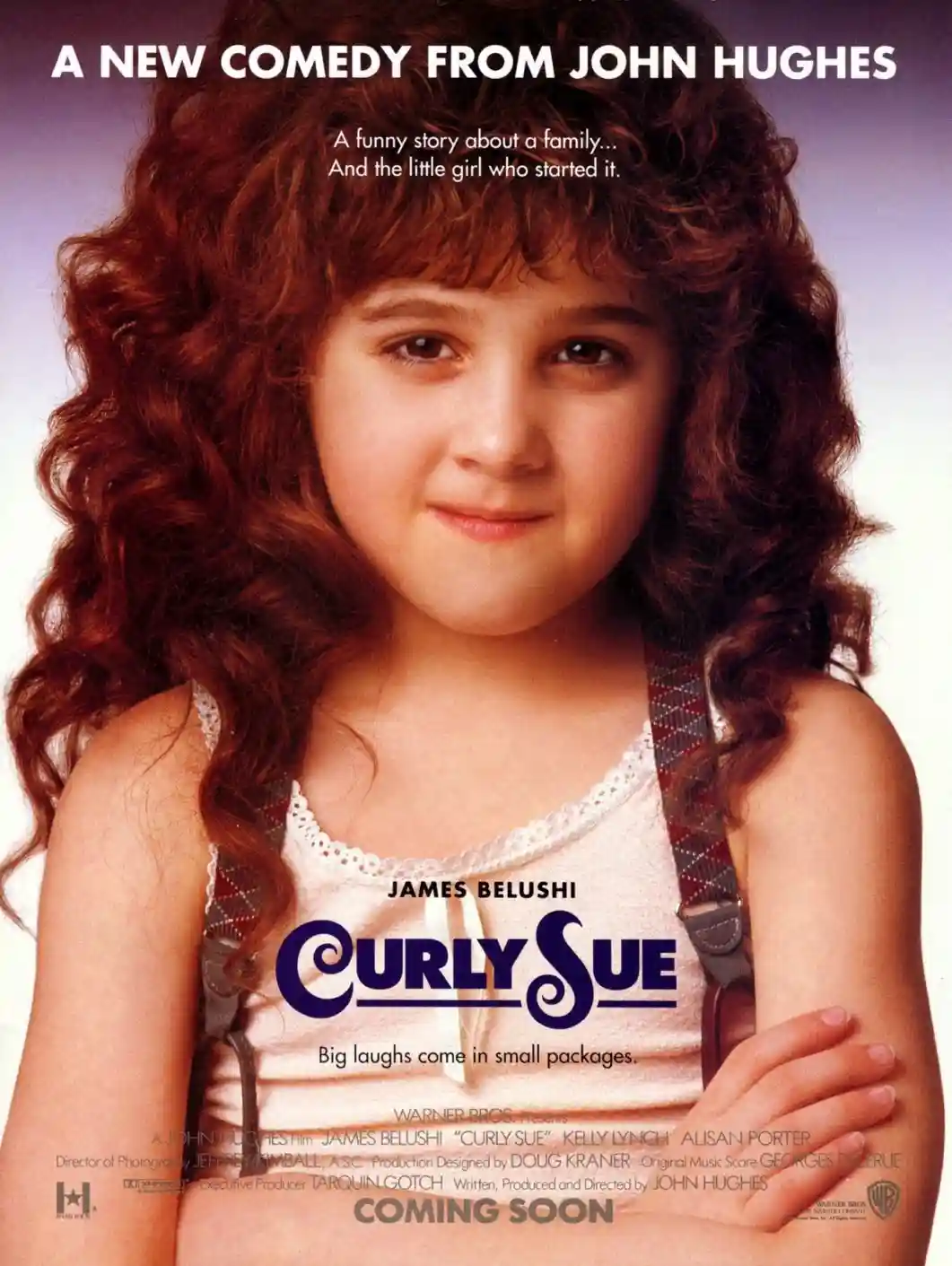 This is a movie poster for the 1985 film 'Curly Sue,' featuring a young girl with voluminous curly red hair wearing a white…