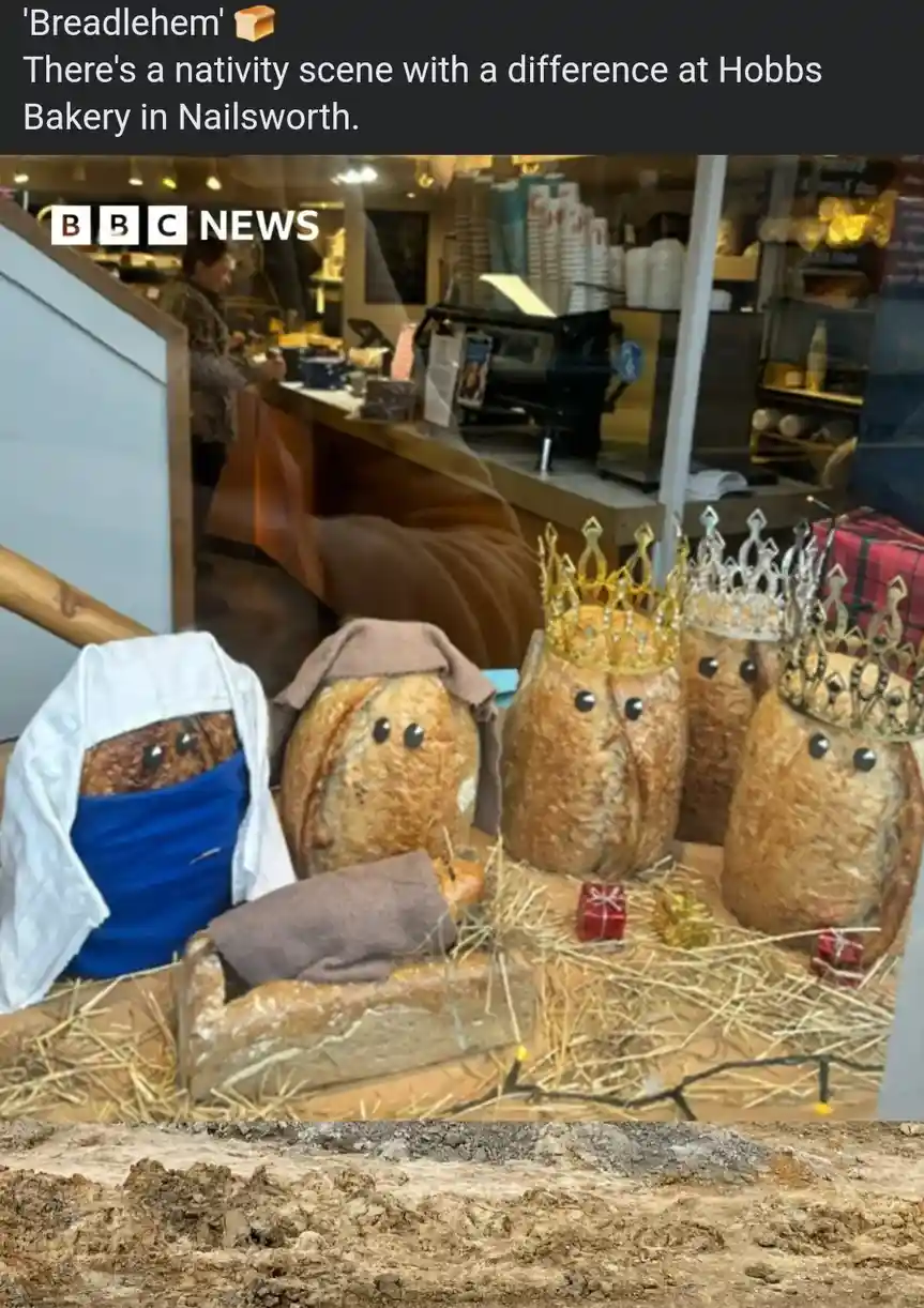 A nativity scene made entirely of bread loaves, with figures resembling Mary, Joseph, and three kings wearing crowns…