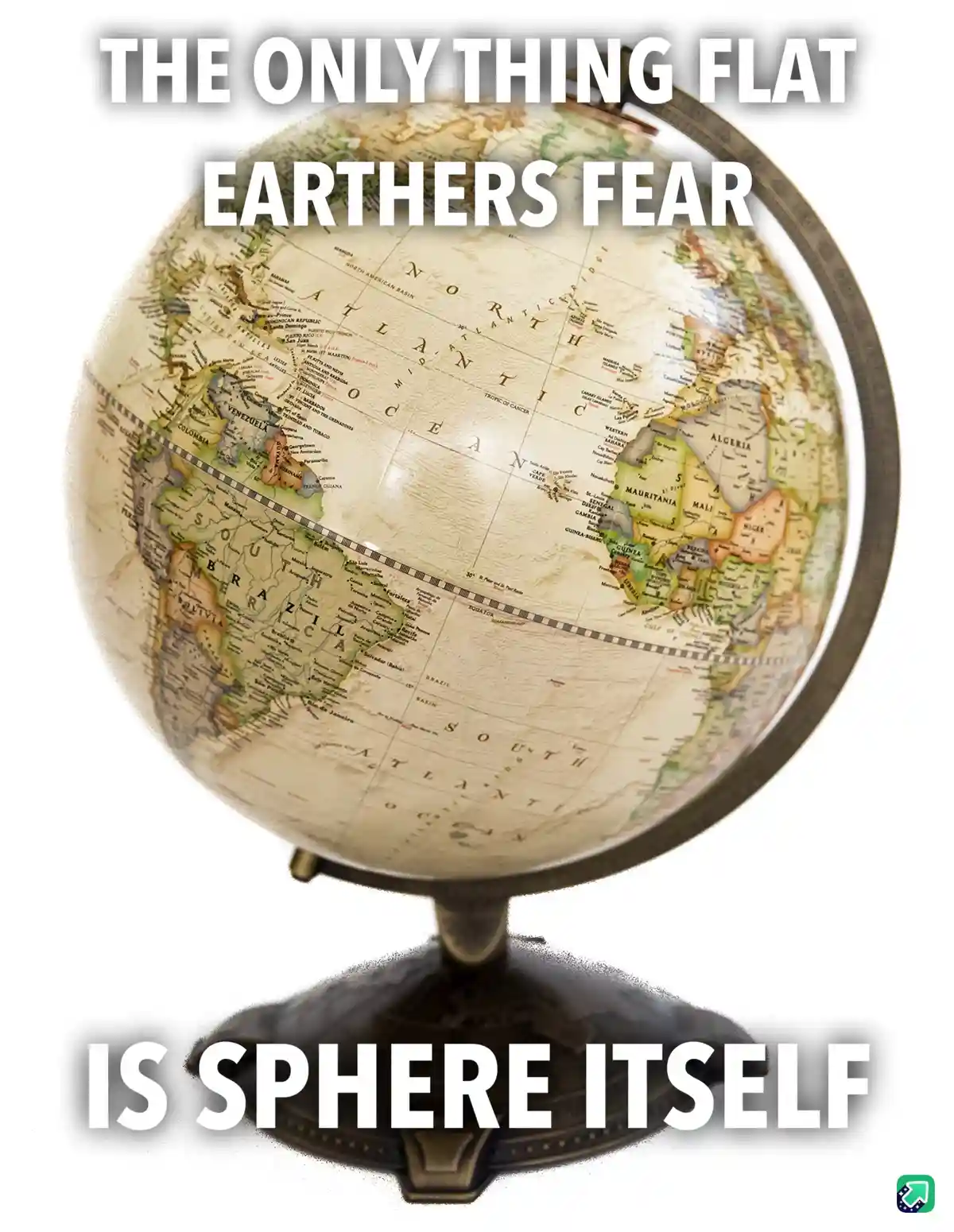 A close-up photo of a vintage-style globe showing the Atlantic Ocean, South America, and parts of Africa and Europe, with…