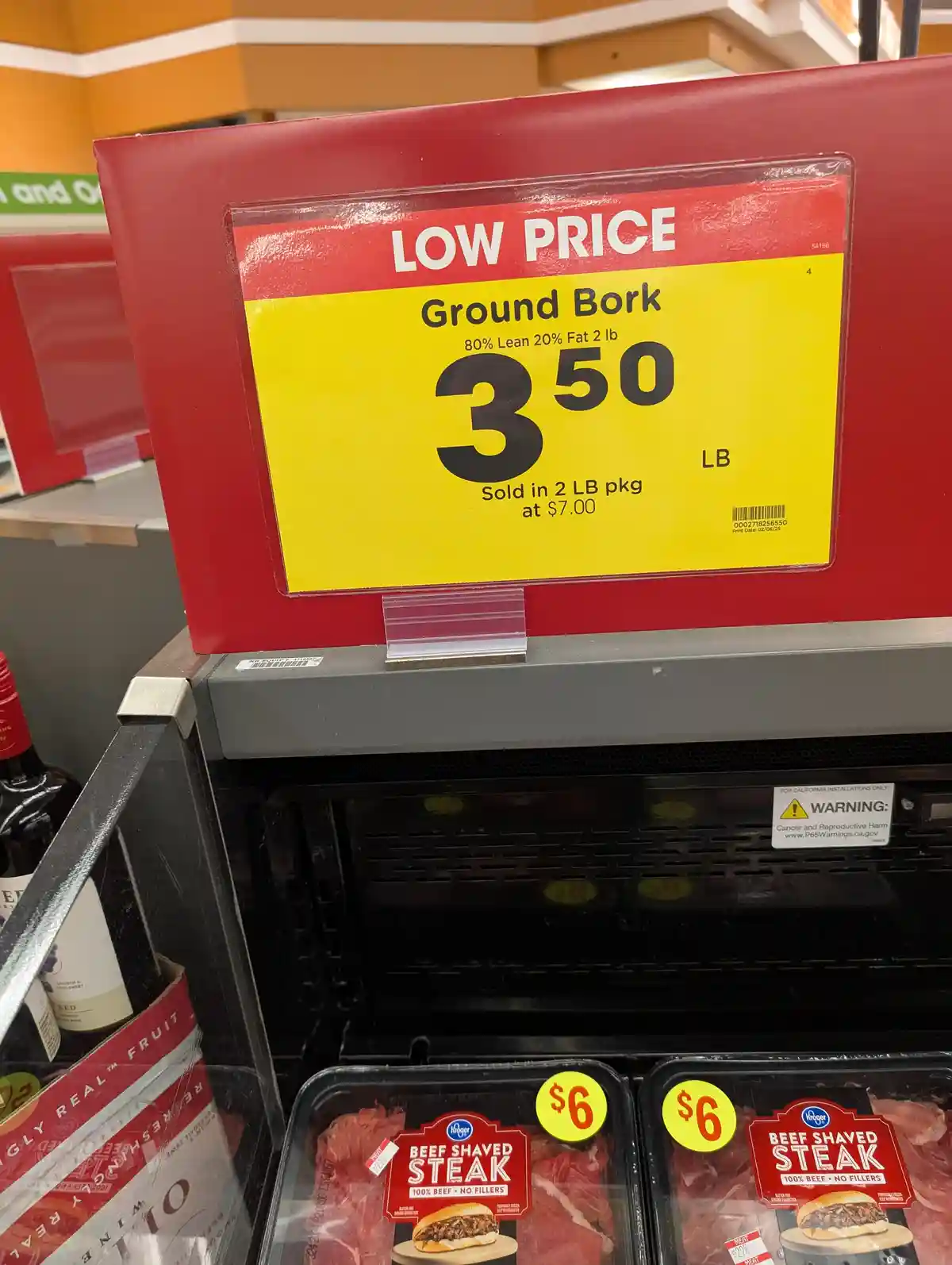 A supermarket meat aisle price tag humorously mislabels 'Ground Bork' as a low-price meat product, priced at $3.50 per…