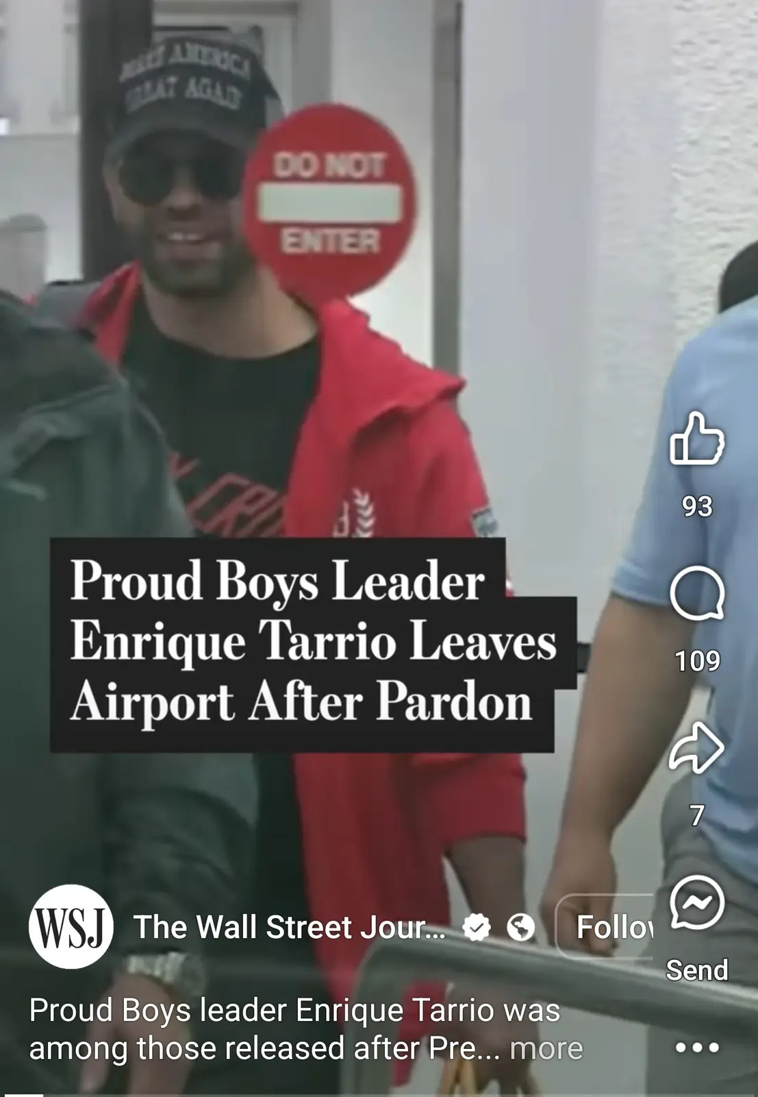 A man wearing a 'Make America Great Again' cap and sunglasses, with a red 'DO NOT ENTER' sign partially obscuring his face…