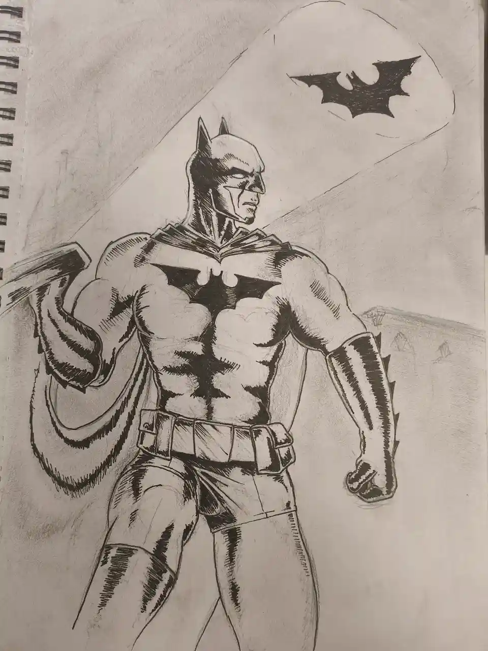 A pencil sketch of Batman standing heroically in a dynamic pose, wearing his iconic cowl, cape, and chest emblem, with a bat…