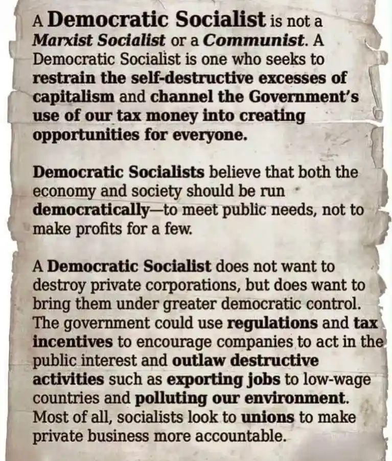 The image displays a text passage on aged, torn paper, defining democratic socialism as distinct from Marxism and communism…