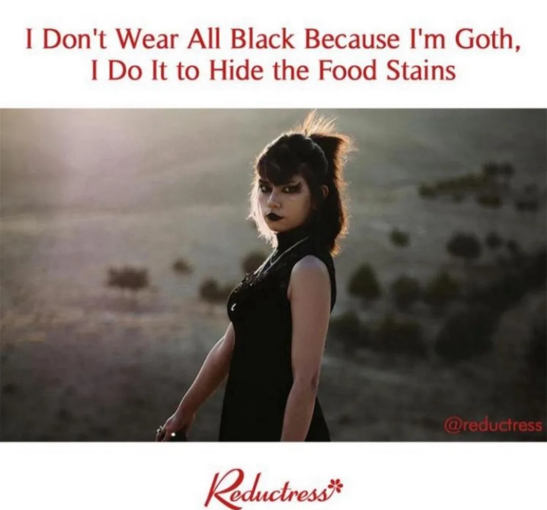 A woman with dark makeup and a black dress stands outdoors in a hazy, sunlit landscape. The overlaid red text reads: 'I…