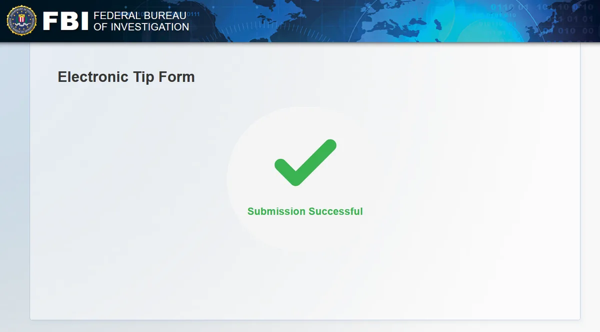 An image of an FBI Electronic Tip Form webpage showing a large green checkmark and the text 'Submission Successful' centered…