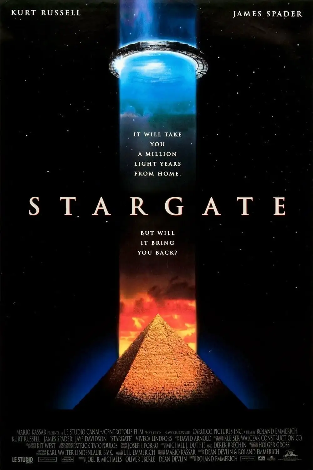 The image is the movie poster for 'Stargate,' featuring a glowing blue wormhole connecting a pyramid to space. The text…