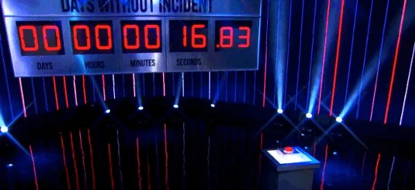 A split-screen image shows a game show stage with three digital timers labeled 'DAYS WITHOUT INCIDENT' counting up in…