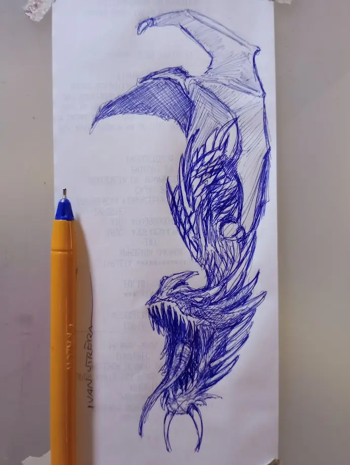 A blue ink sketch of a detailed, stylized dragon with wings spread, drawn on paper that has faint, illegible printed text. A…