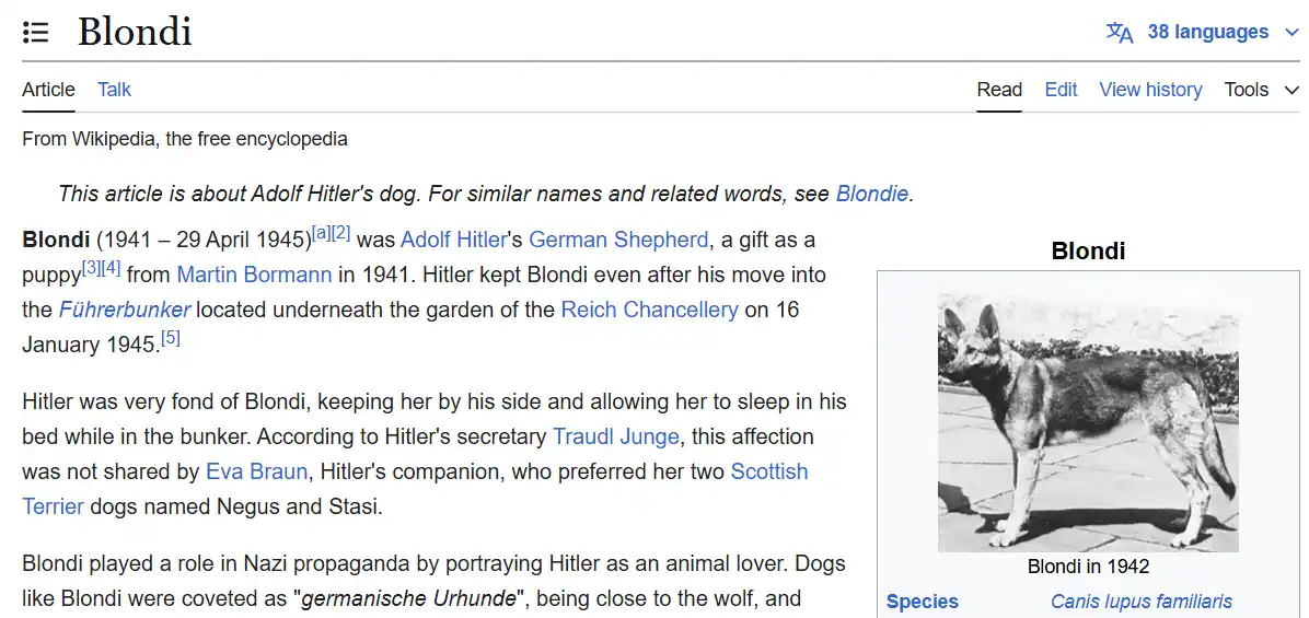 A black-and-white photograph of a German Shepherd dog named Blondi, standing outdoors in 1942, is displayed on a Wikipedia…