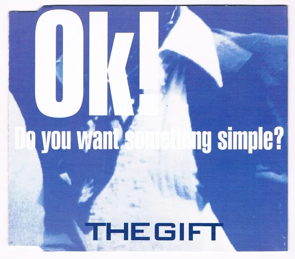 A blue-tinted image of a person in a white shirt, overlaid with large white text reading 'Ok! Do you want something simple?'…