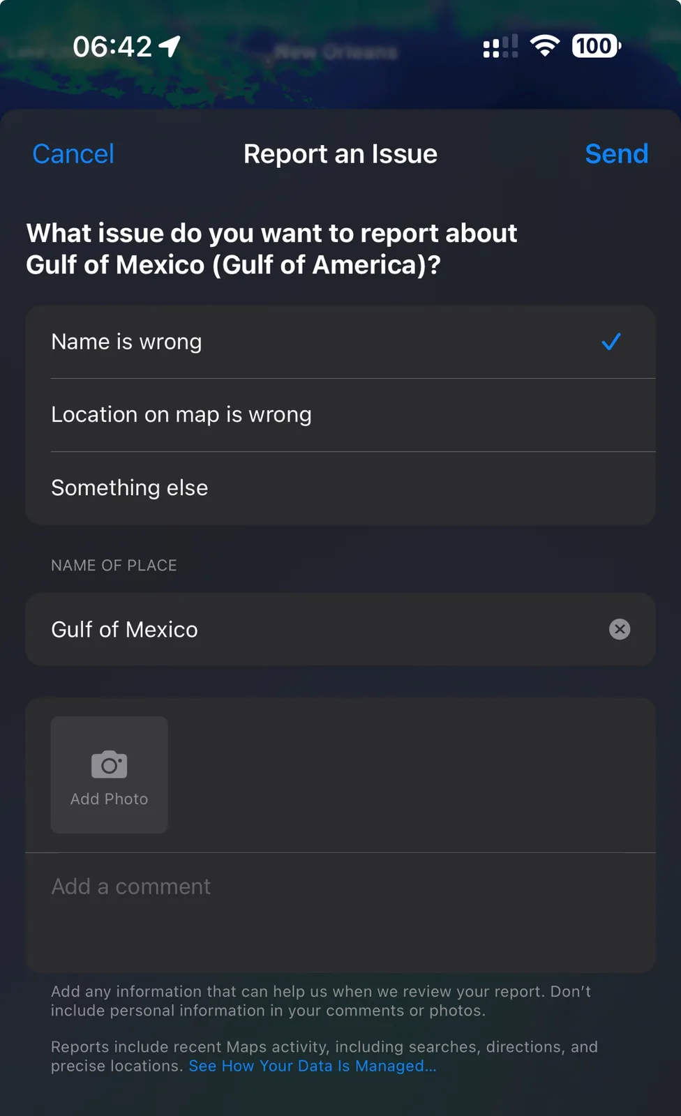 A screenshot of a mobile map app's 'Report an Issue' screen, where the user has selected 'Name is wrong' for the location…